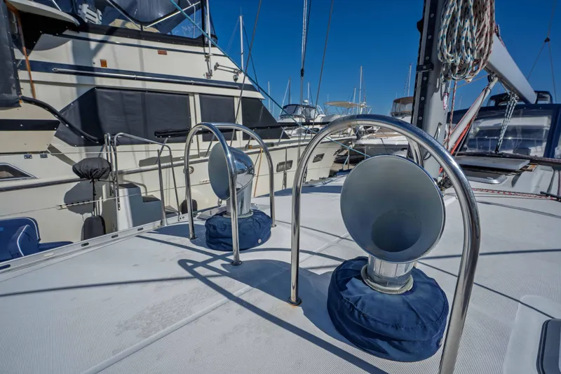 Slide: The Image of Deck view of 2003 Jeanneau Sun Odyssey 45.2 sailboat in marina. - 12