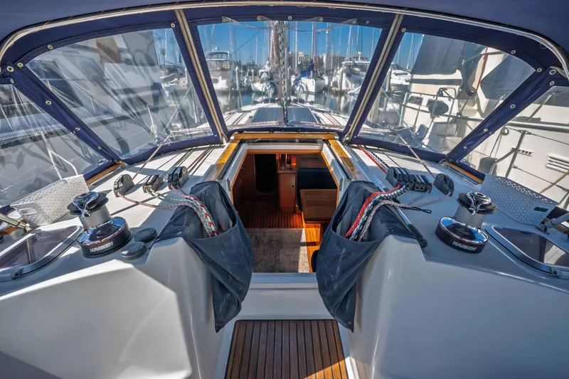 Slide: The Image of Running rigging lines run aft into cockpit and stowed in mesh line bags. - 31