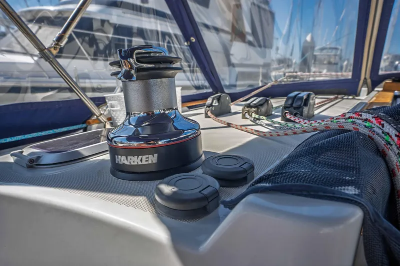 Slide: The Image of Harken electric power winch on port coachroof for handling various running rigging lines. - 32