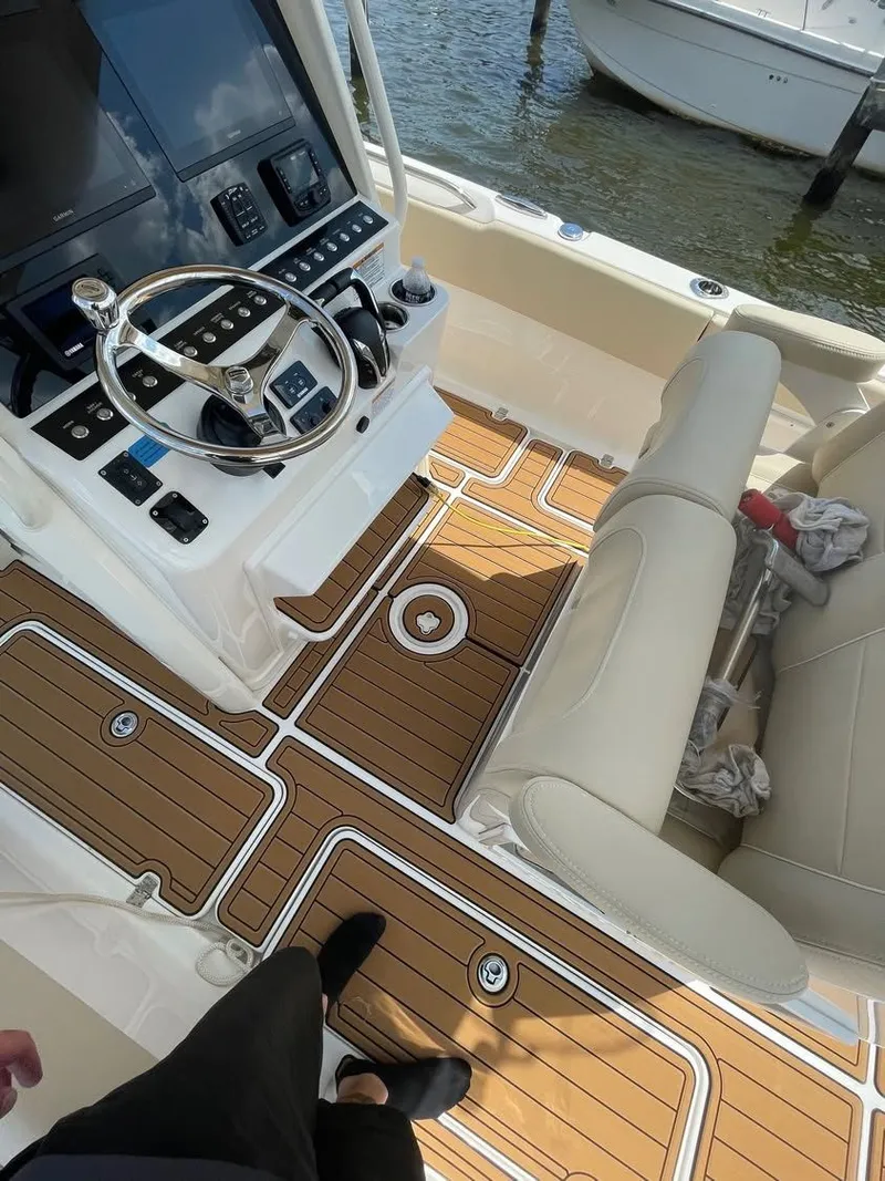 Slide: The Image of Interior of a 2021 Century 2400 boat with modern cockpit. - 4