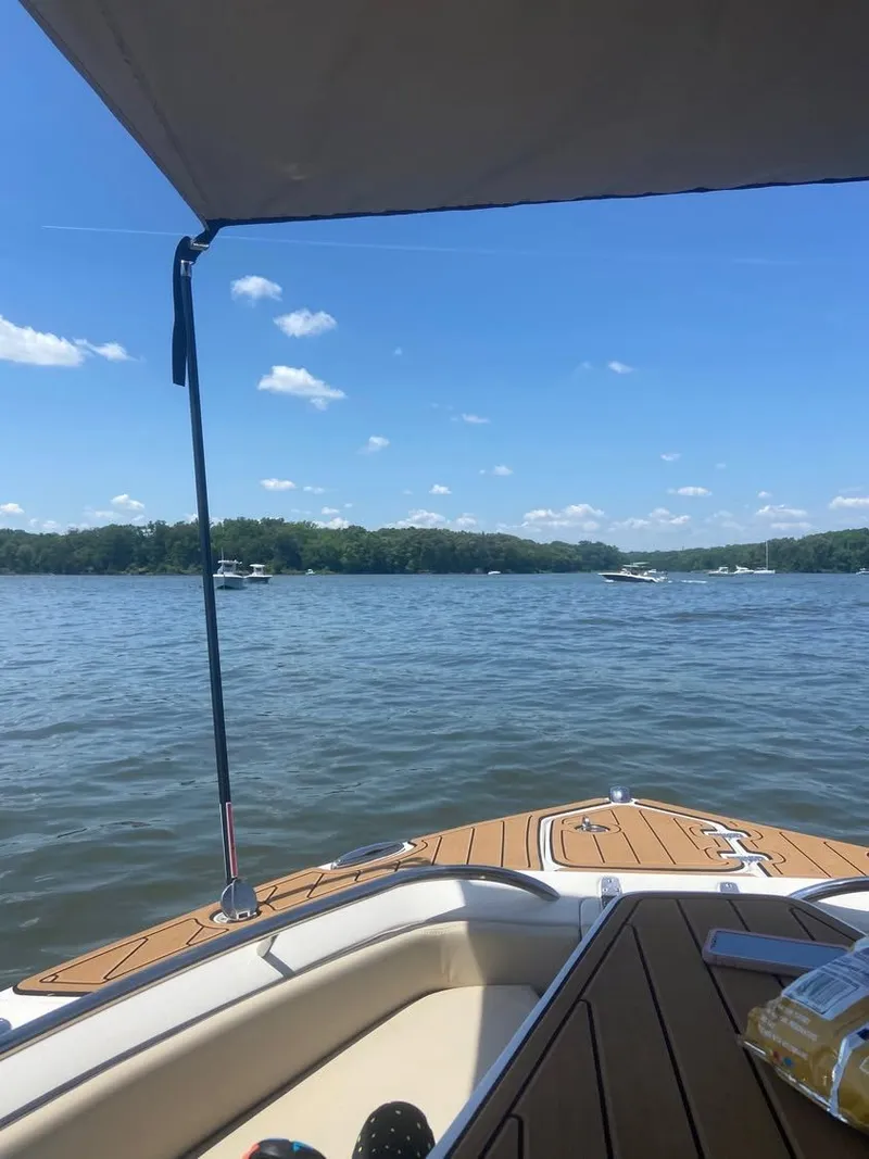 Slide: The Image of Century 2400 boat on a calm lake, 2021 model. - 6