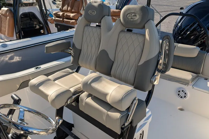 Slide: The Image of Luxury seating on 2026 Key West 239 FS boat, featuring plush, ergonomic design. - 12