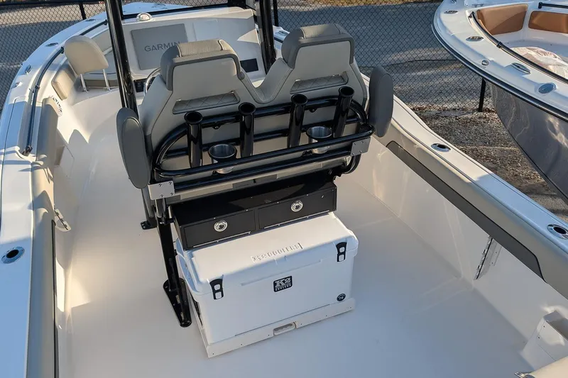 Slide: The Image of 2026 Key West 239 FS boat interior with seating and storage compartments. - 9