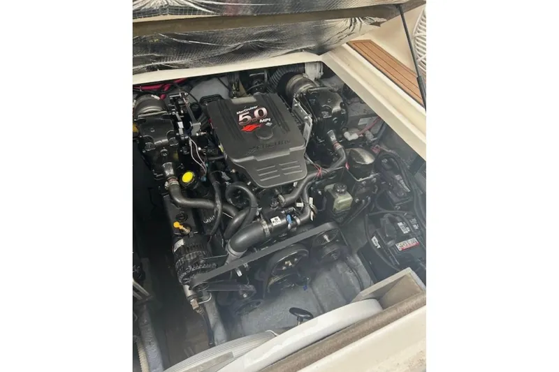 Slide: The Image of Engine compartment of a 2003 Sea Ray Sundancer 280 boat. - 11