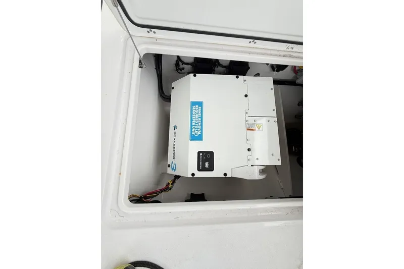 Slide: The Image of 2025 Sportsman Open 352 Center Console interior with radio and speaker system. - 16