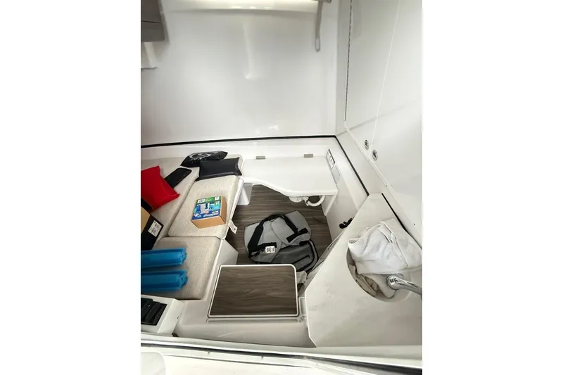 Slide: The Image of 2025 Sportsman Open 352 Center Console engine compartment with Seakeeper stabilization unit. - 20