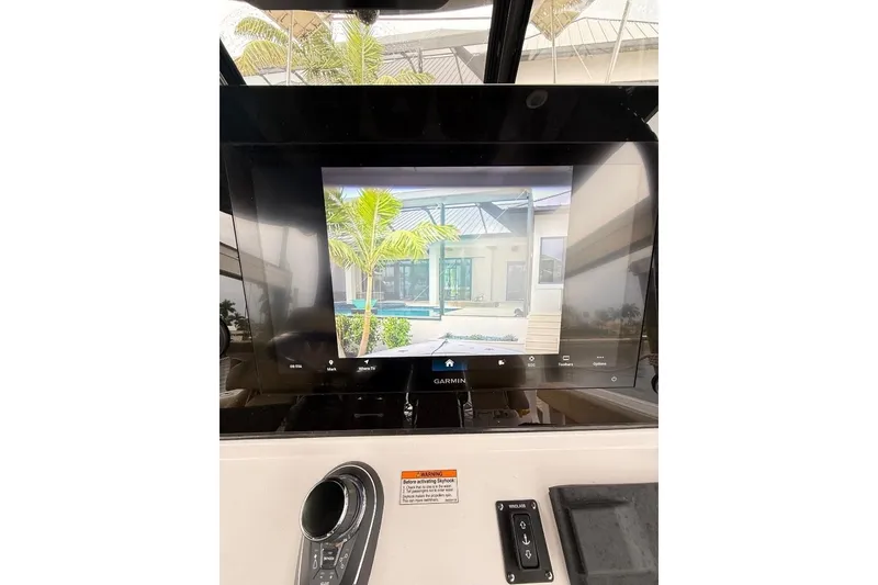 Slide: The Image of 2025 Sportsman Open 352 Center Console with advanced navigation equipment. - 8