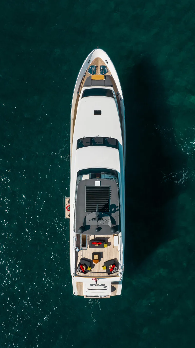 Slide: The Image of Aerial view of 2018 Sanlorenzo SL106 yacht on clear blue water. - 11