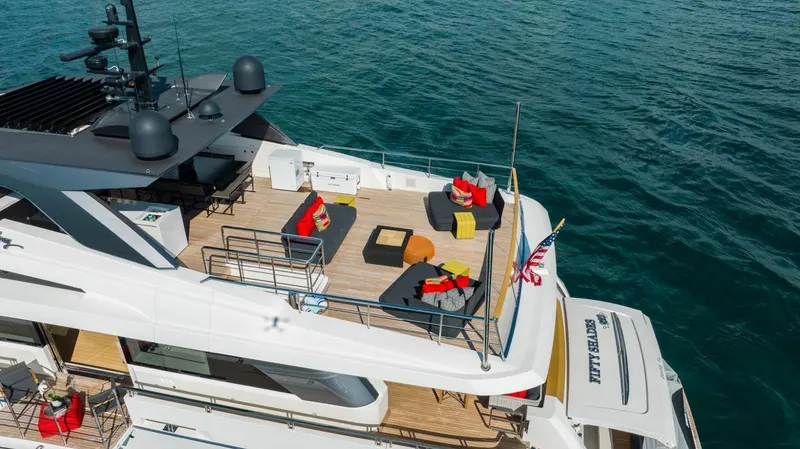 Slide: The Image of Sanlorenzo SL106 2018 yacht with spacious deck and luxurious seating on the water. - 14