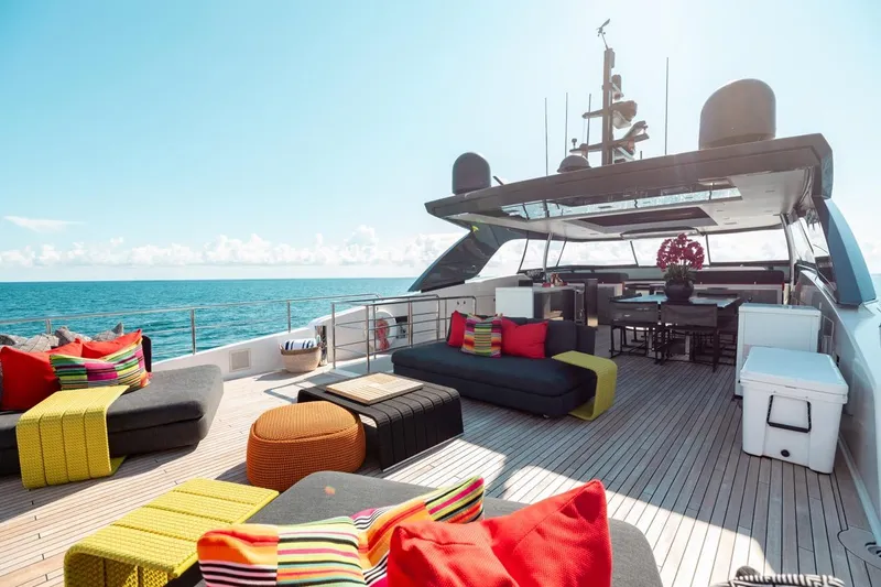 Slide: The Image of Luxurious 2018 Sanlorenzo SL106 yacht deck with colorful seating, ocean view, and modern design. - 16