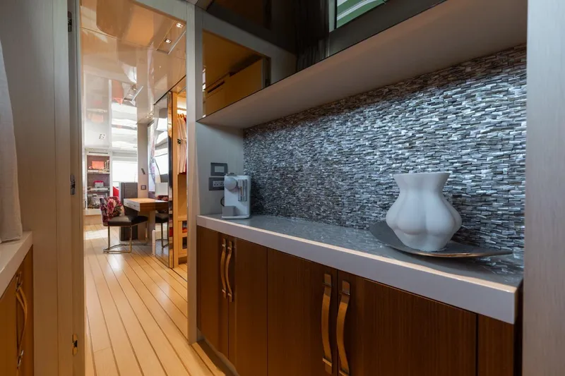 Slide: The Image of Interior of 2018 Sanlorenzo SL106 yacht with modern decor and wooden flooring. - 27