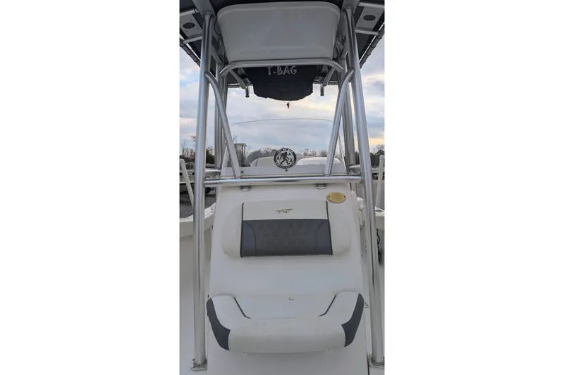 Slide: The Image of 2017 Tidewater 210 LXF boat interior with T-top and seating. - 4