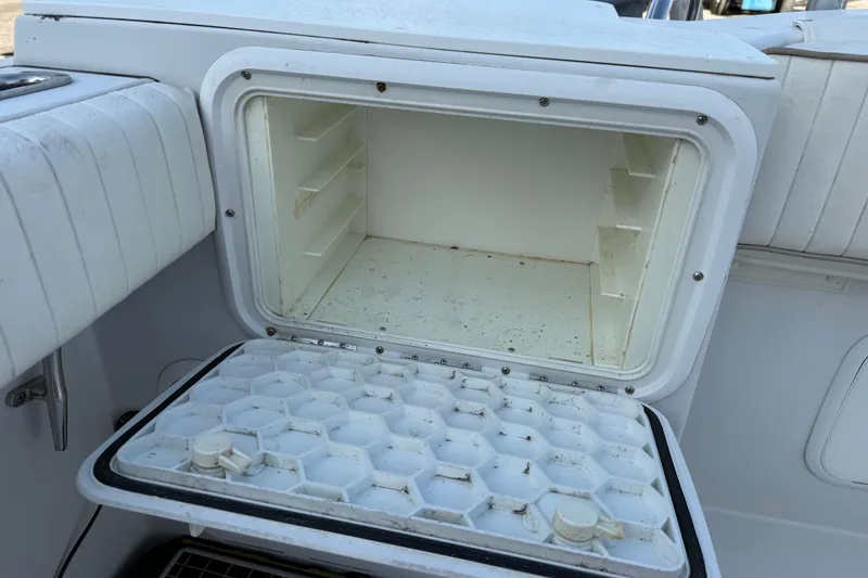 Slide: The Image of Open storage compartment on 2005 Glacier Bay 2680 Coastal Runner boat. - 18