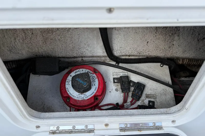 Slide: The Image of Electrical control panel inside 2005 Glacier Bay 2680 Coastal Runner boat compartment. - 23