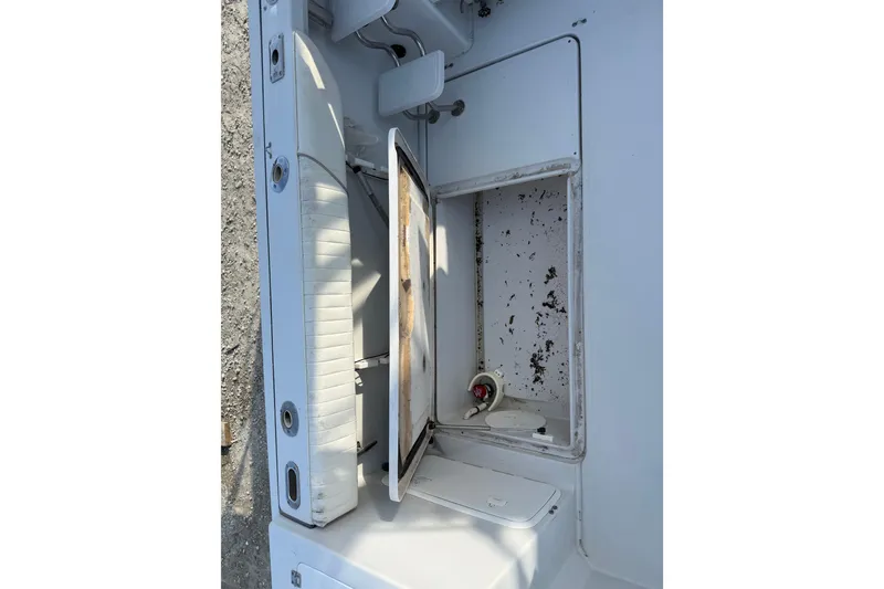 Slide: The Image of Open storage compartment on 2005 Glacier Bay 2680 Coastal Runner boat. - 25