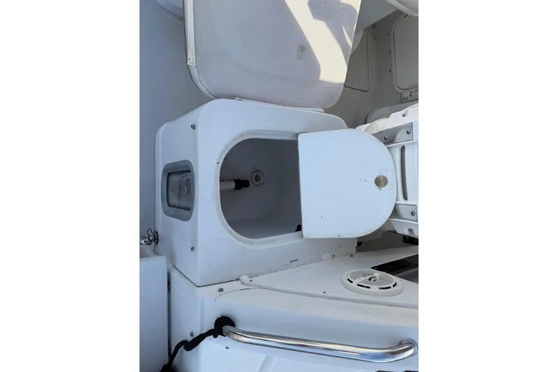 Slide: The Image of 2005 Glacier Bay 2680 Coastal Runner boat interior storage compartment. - 27