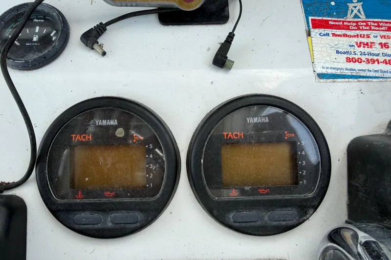 Slide: The Image of Dashboard of a 2005 Glacier Bay 2680 Coastal Runner with Yamaha tachometers. - 34