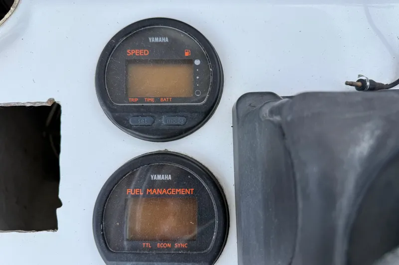 Slide: The Image of Yamaha speed and fuel management gauges on 2005 Glacier Bay 2680 Coastal Runner boat. - 35