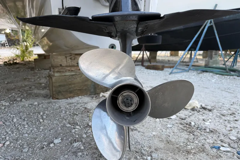 Slide: The Image of Close-up of a 2005 Glacier Bay 2680 Coastal Runner boat propeller on dry land. - 52