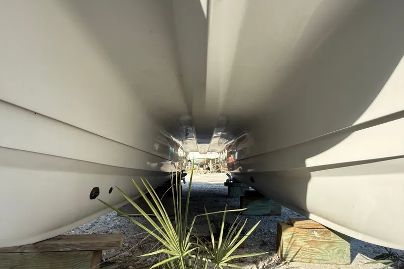 Slide: The Image of Underneath view of 2005 Glacier Bay 2680 Coastal Runner catamaran hull. - 7