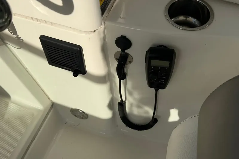 Slide: The Image of Interior of 2020 World Cat 230 SD boat with Garmin speaker and radio. - 16