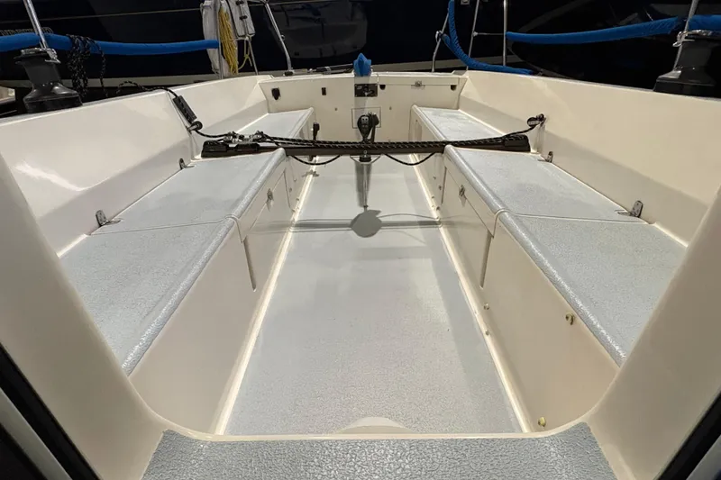 Slide: The Image of 2006 J Boats J/100 sailboat cockpit with seating and steering wheel. - 19