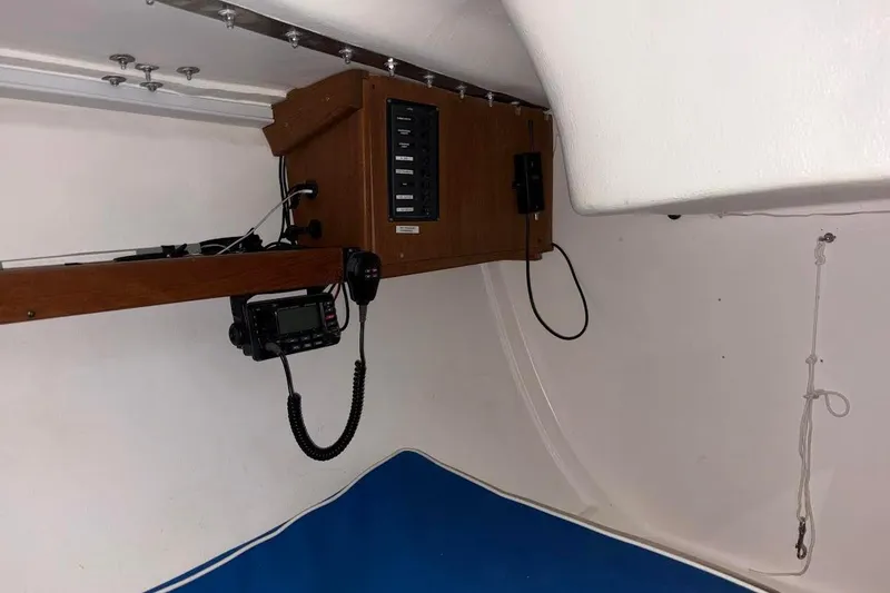 Slide: The Image of Interior of 2006 J Boats J/100 sailboat with radio and control panel. - 25