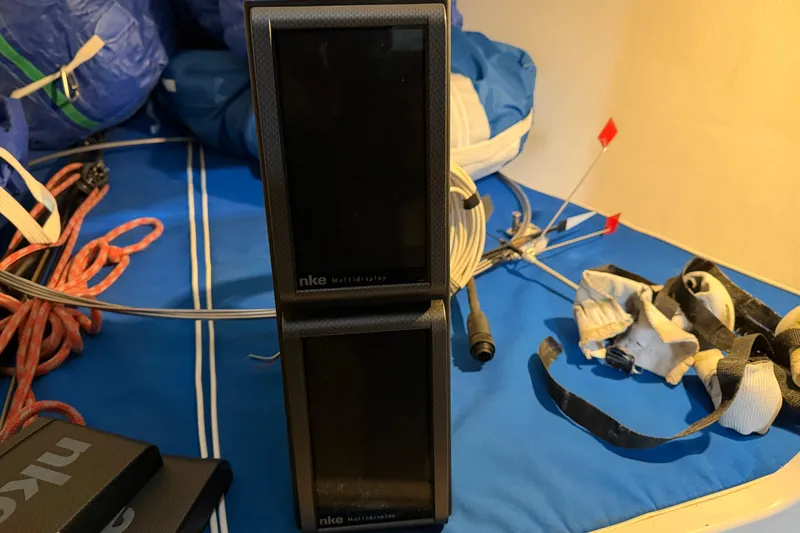 Slide: The Image of NKE Multidisplay equipment on a 2006 J Boats J/100 sailboat, with ropes and gear. - 30