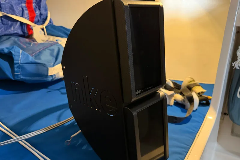 Slide: The Image of Navigation equipment on a 2006 J Boats J/100 sailboat, with colorful gear in the background. - 31