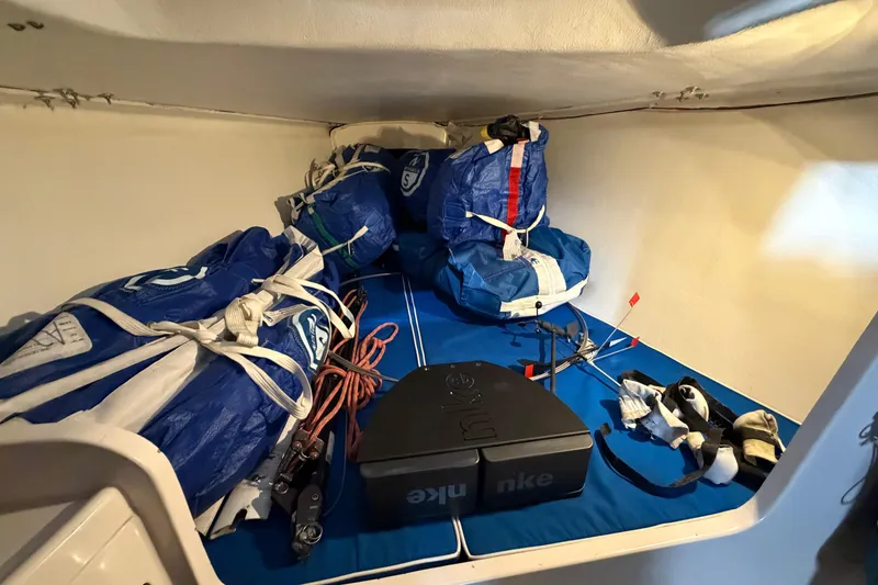 Slide: The Image of Interior of 2006 J Boats J/100 sailboat with sails and equipment stored neatly. - 40