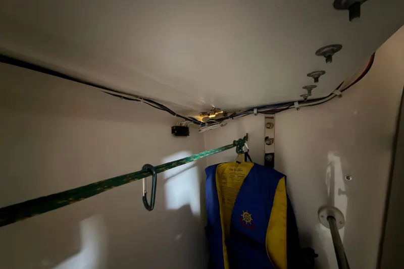 Slide: The Image of Interior of 2006 J Boats J/100 showing life jacket and wiring. - 42