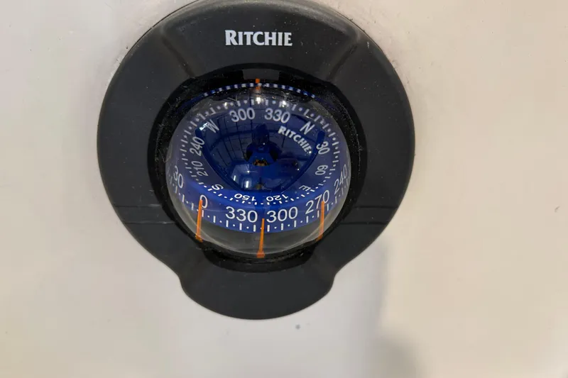 Slide: The Image of Ritchie compass on 2006 J Boats J/100 sailboat, displaying navigational degrees. - 47