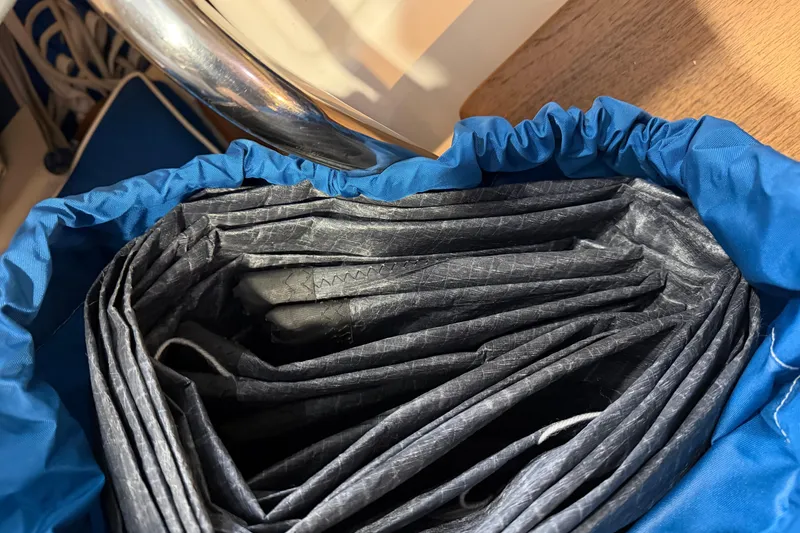 Slide: The Image of Folded sail in blue bag on 2006 J Boats J/100 yacht. - 49