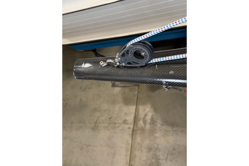 Slide: The Image of Close-up of a 2006 J Boats J/100 carbon fiber boom with rigging details. - 54
