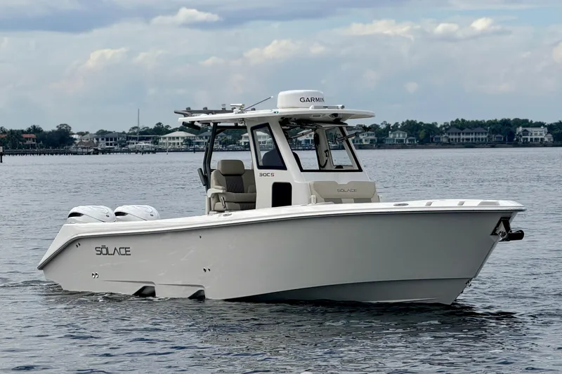 The Image of 2026 Solace 30 CS boat on calm water, featuring sleek design and modern technology. - 0