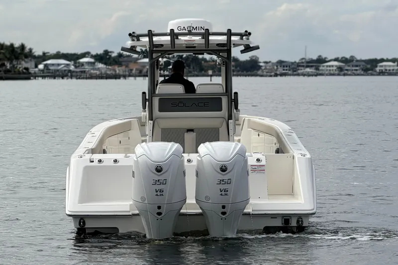 Slide: The Image of 2026 Solace 30 CS boat with twin Yamaha 350 V6 engines on water. - 8