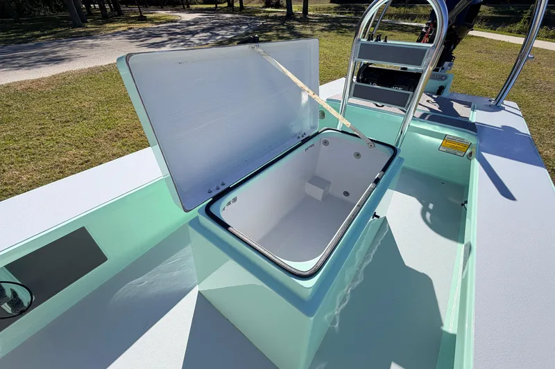 Slide: The Image of 2011 Hell's Bay Glades Skiff with open storage compartment, showcasing sleek design and functionality. - 30