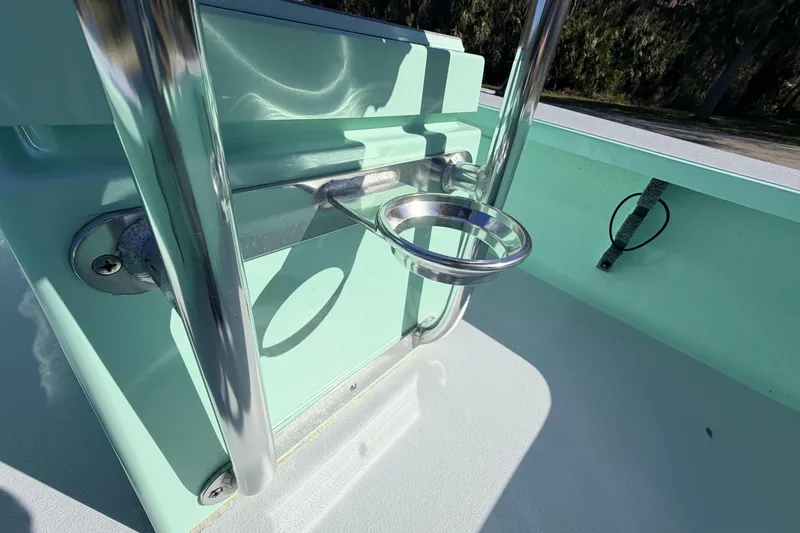 Slide: The Image of 2011 Hell's Bay Glades Skiff boat detail with stainless steel rod holder. - 36