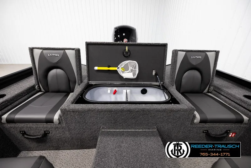 Slide: The Image of 2025 Lund 1975 Renegade boat interior with storage compartments and seating. - 18
