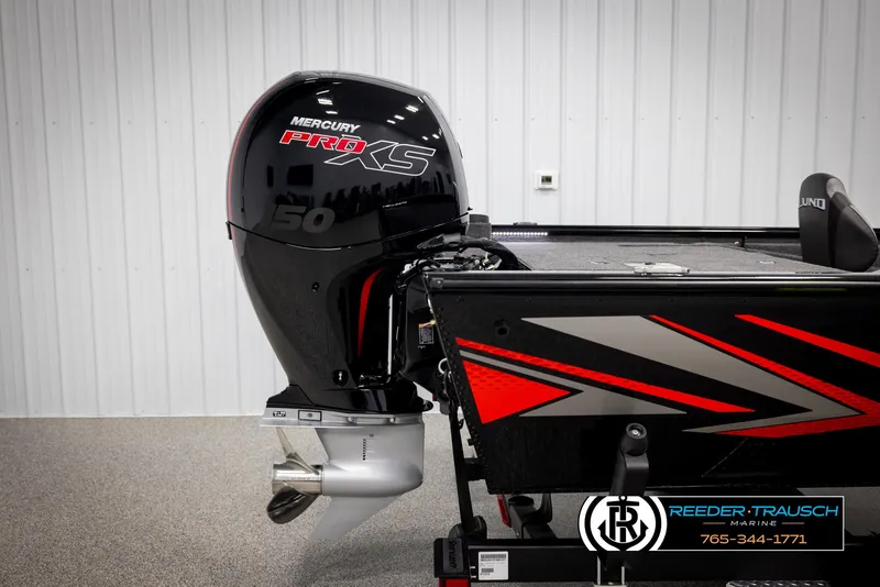Slide: The Image of 2025 Lund 1975 Renegade boat with Mercury Pro XS 50 engine, side view. - 43