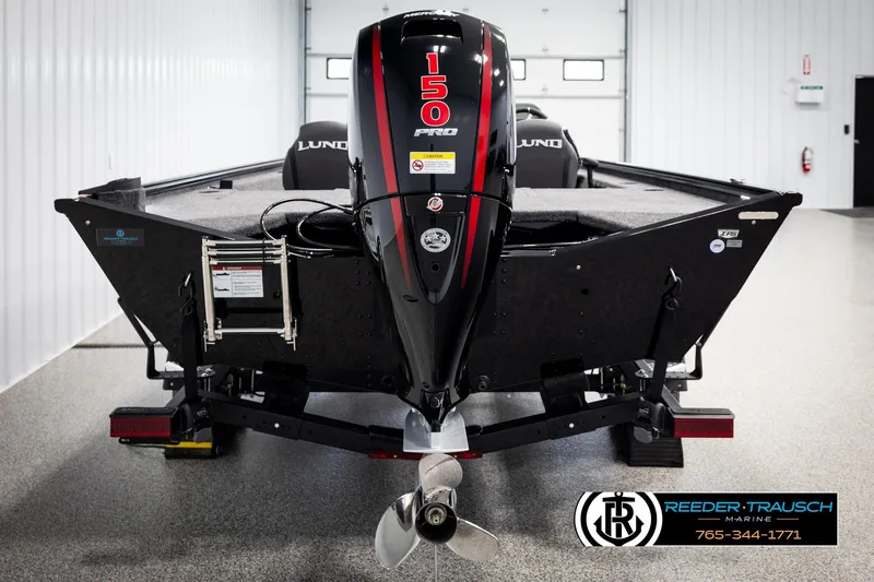 Slide: The Image of 2025 Lund 1975 Renegade boat with 150 Pro motor in showroom. - 5