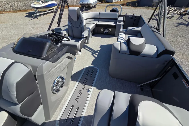 Slide: The Image of 2026 Avalon Platinum Catalina 2585 Elite pontoon boat interior with luxurious seating and helm. - 5