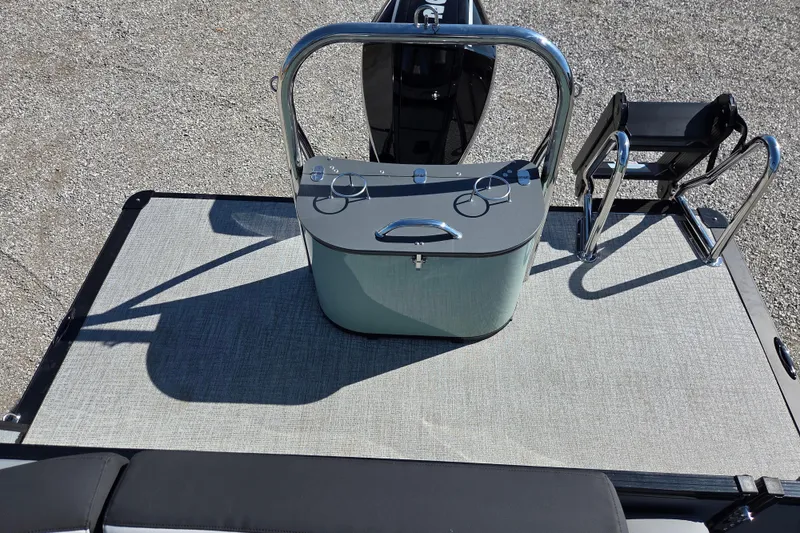 Slide: The Image of 2026 Avalon Platinum Catalina 2585 Elite boat deck with seating and ladder. - 9