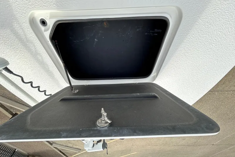 Slide: The Image of Open storage compartment of a 2018 SCB Recon vehicle, showing interior details. - 15