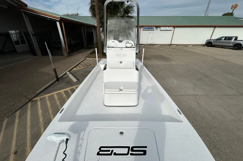 Slide: The Image of 2018 SCB Recon boat in a parking lot, showcasing sleek design and modern features. - 16