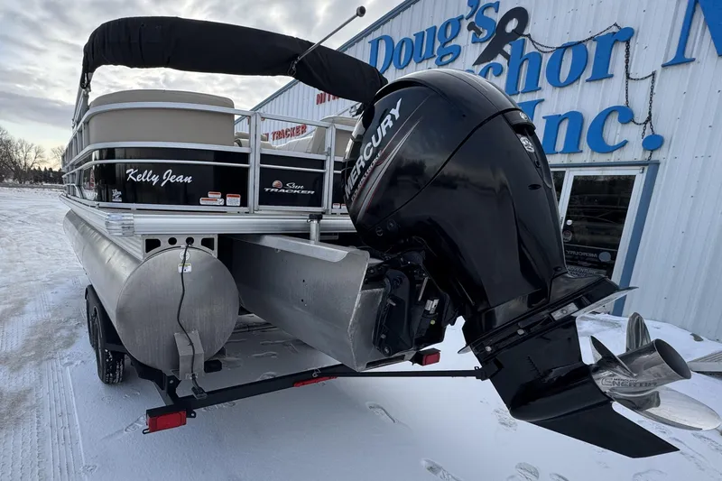 Slide: The Image of 2018 Sun Tracker Party Barge 22 XP3 with Mercury outboard motor in snowy setting. - 6