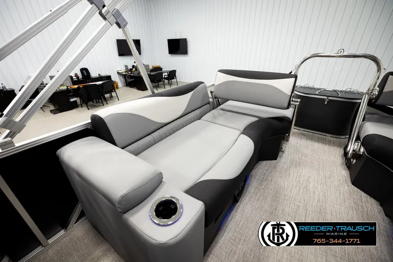 Slide: The Image of Luxurious interior of 2026 Avalon LSZ QLS pontoon boat with modern seating and cup holder. - 20