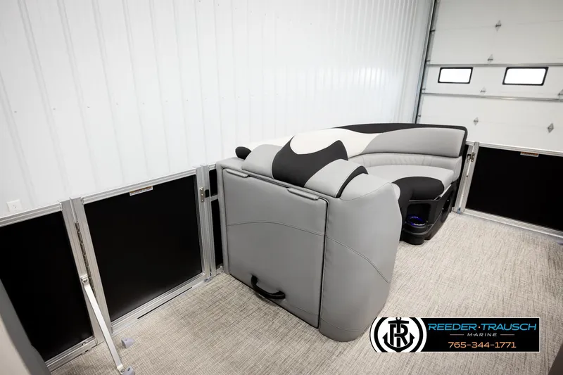 Slide: The Image of 2026 Avalon LSZ QLS pontoon boat interior with modern seating in a showroom. - 35