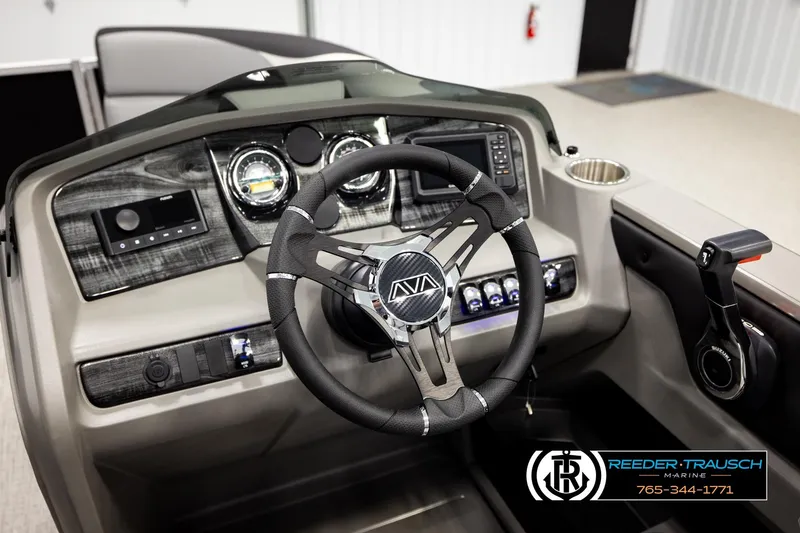 Slide: The Image of Interior view of 2026 Avalon LSZ QLS boat dashboard with modern controls and steering wheel. - 38