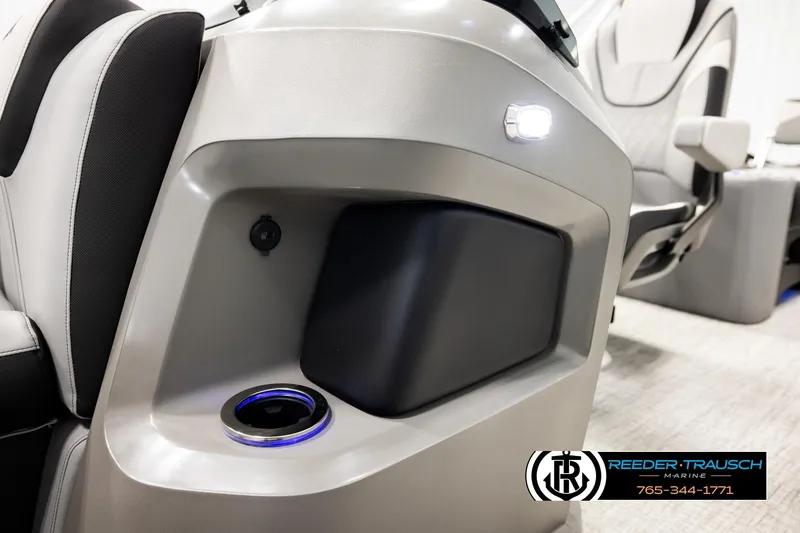 Slide: The Image of 2026 Avalon LSZ QLS boat interior with illuminated cup holder and seating. - 52